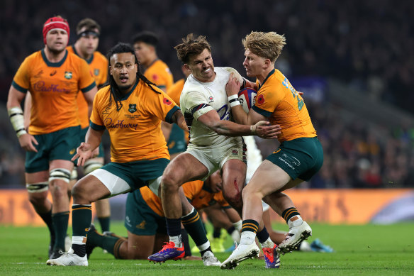 Tate McDermott of Australia is tackled by Henry Slade during last weekend’s Test.