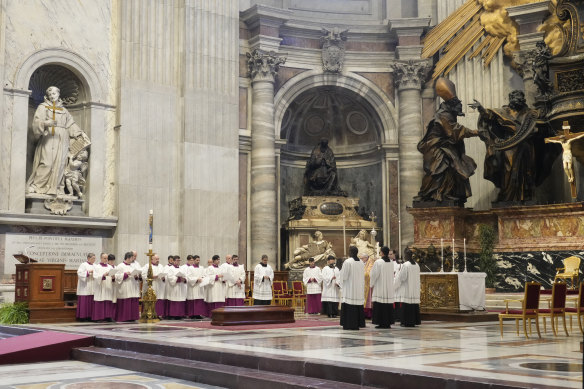 The coffin of Cardinal George Pell in St Peter’s Basilica before the requiem mass.