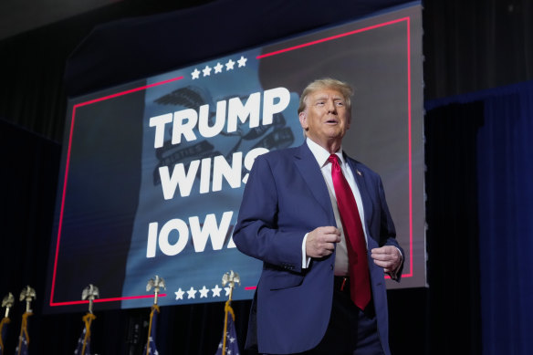 Donald Trump celebrates his Iowa success with supporters in Des Moines.