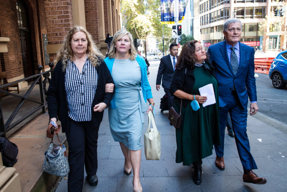 From right to left: Steve Johnson, his wife Rosemarie and sisters Becca and Terry arrive at the NSW Supreme Court on Monday.