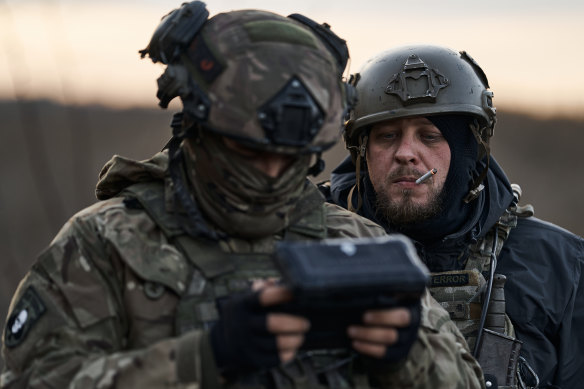 Ukrainian military special unit “Kurt & Company group” armed with homemade mini-MLRS fires at Russian positions on the front line in Bakhmut on October 29.