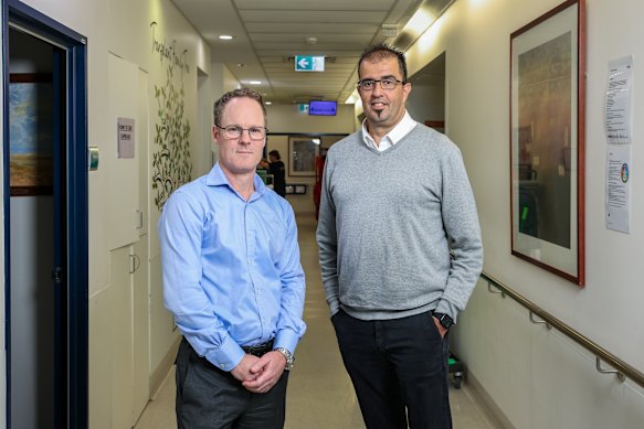 Austin Health transplant surgeon Graham Starkey and his patient Frank Giamarelos.