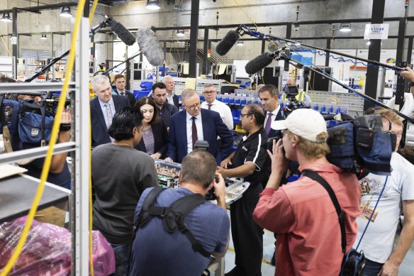Then opposition leader Anthony Albanese visits the Brisbane factory of Tritium in April 2022, during the election campaign. 