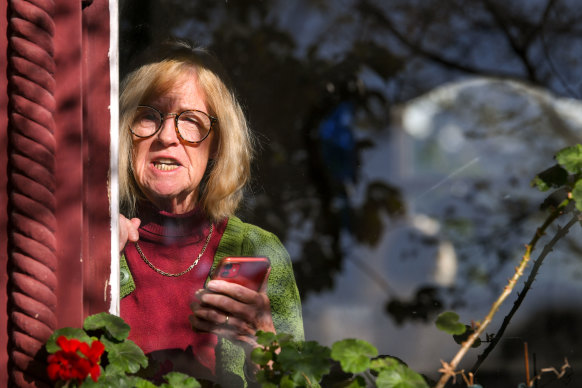 School founder Faye Berryman reads a statement on Monday morning.