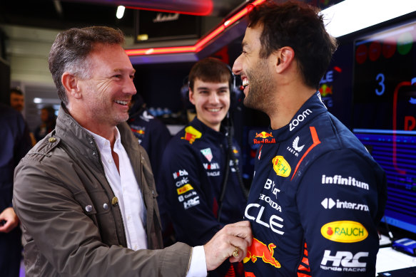 Daniel Ricciardo speaking with Red Bull Racing Team Principal Christian Horner as he prepares to drive during Formula 1 testing at Silverstone Circuit on Tuesday.