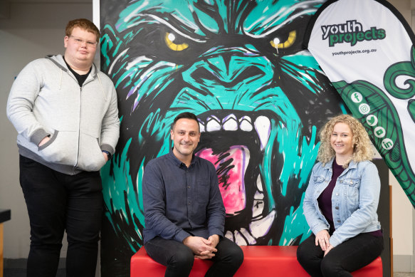 Youth Projects chief executive Ben Vasiliou (centre) says the long wait times for young people seeking mental health services make him wince.