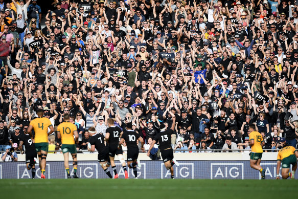 The All Blacks faithful cheer a Sam Cane try.