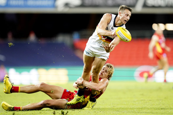 Greenwood, tackling the Crows' Tom Doedee, made 13 tackles to go with 10 contested possessions and eight clearances to set the tone for his team's performance.