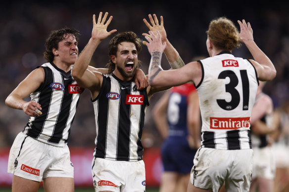 Collingwood’s Josh Daicos celebrates on the siren as the Pies beat Melbourne.