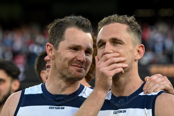 Patrick Dangerfield celebrates a premiership with Cats’ skipper Joel Selwood. 
