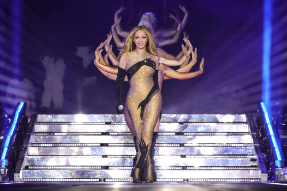 Beyoncé performing onstage in a Loewe handprint bodysuit.