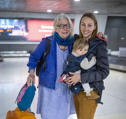 'I'm so happy': Suzy Young, left, is reunited with daughter Madeleine and grandson Maxwell.