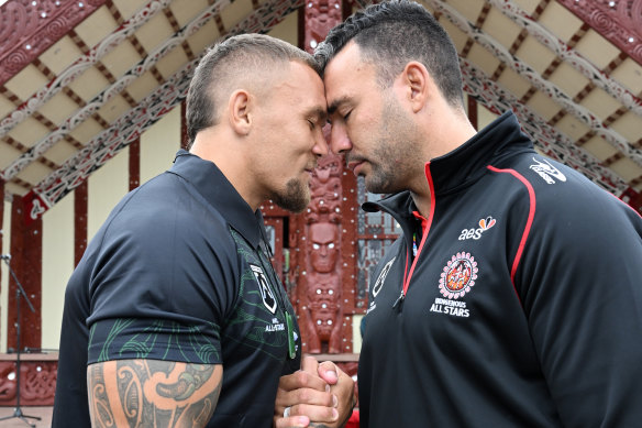 James Fisher-Harris and Ryan James share a traditional Maori greeting.