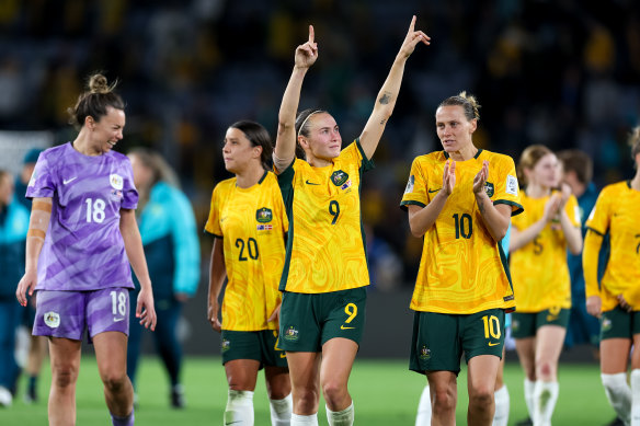 Matildas celebrated after 2-0 victory.