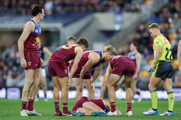 Marcus Adams pictured injured on the ground in round 21.