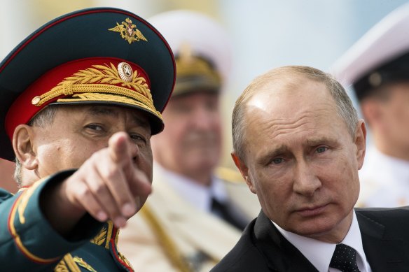 Russian President Vladimir Putin and Defence Minister Sergei Shoigu. 