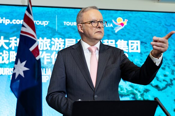 The prime minister answers questions about how Australia would respond to conflict over Taiwan, during a press conference on tourism in Shanghai.