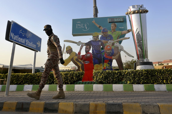 A soldier patrols outside Pakistan’s National Stadium in Karachi before the launch of the Pakistan Super League.