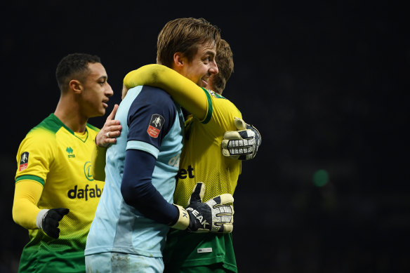 Norwich goalkeeper Tim Krul celebrates the victory over Tottenham.