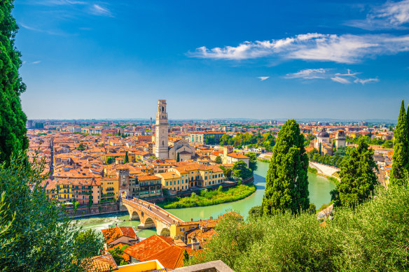 Verona’s historical city centre with the  Ponte Pietra bridge across the Adige river and Verona Cathedral.