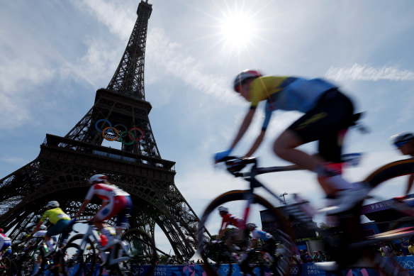 Cyclists compete in the Women’s Road Race under the shadow of the Eiffel Tower on day nine of the Olympic Games in Paris on August 4.
