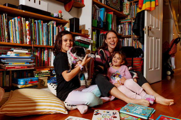 Harding with Eve and Margo, who enjoy reading books about families like theirs, with two mums. 