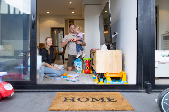 Emma and Josh Finch and daughter Grace, 2, in their Windsor apartment.