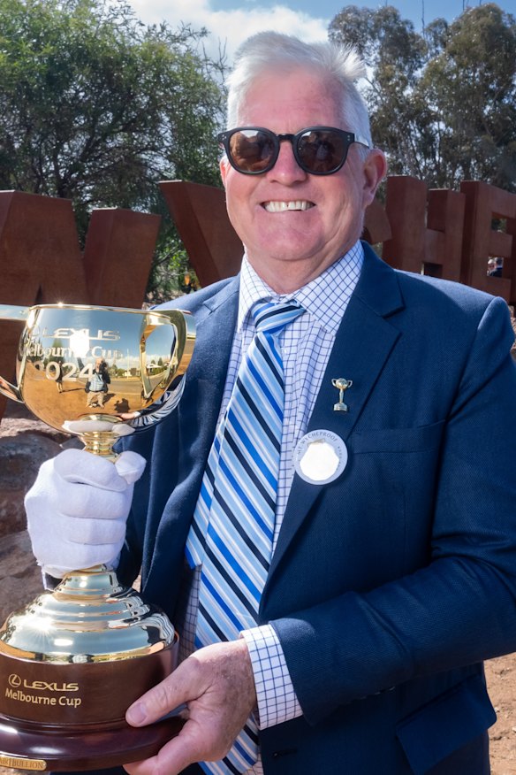Melbourne Cup tour ambassador Merv Keane and the trophy at his home town of Wycheproof.