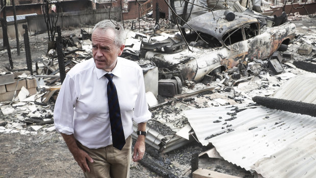 Bill Shorten views the aftermath of the Tathra bushfire.