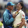 Australia captain Pat Cummins celebrates with coach Andrew McDonald after the first Ashes test.