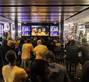 Fans watch the World Cup match between France and Australia at the Coogee Bay Hotel.
