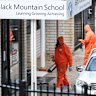 People in hazmat suits at Black Mountain School with some schools in Canberra closed due to potential asbestos contamination.