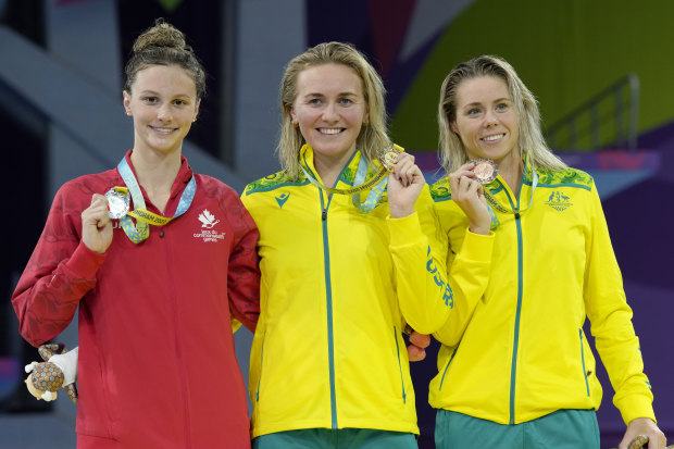 Summer McIntosh, Ariarne Titmus and Kiah Melverton receive their medals after the womens’ 400m final at the Commonwealth Games.
