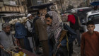 Taliban fighters patrol a market in Kabul’s Old City, Afghanistan. A month after the fall of Kabul, the question of how the world will get aid to citizens without enriching Afghanistan’s Taliban rulers is haunting the country.