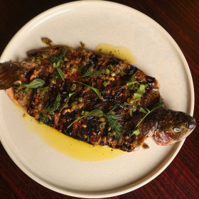 Whole butterflied trout with capers, garlic, lemon and dill.