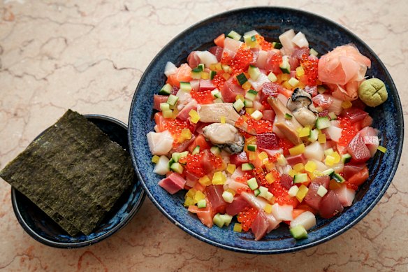 Elka Sushi in Footscray prepares its OG chirashi bowls with cubes of dry-aged Ora King salmon, bluefin tuna, hamachi and snapper.