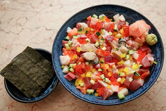 Elka Sushi in Footscray prepares its OG chirashi bowls with cubes of dry-aged Ora King salmon, bluefin tuna, hamachi and snapper.
