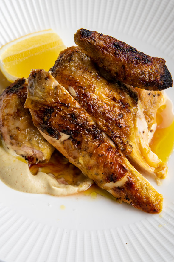Crispy chicken on a smooth eggplant puree.