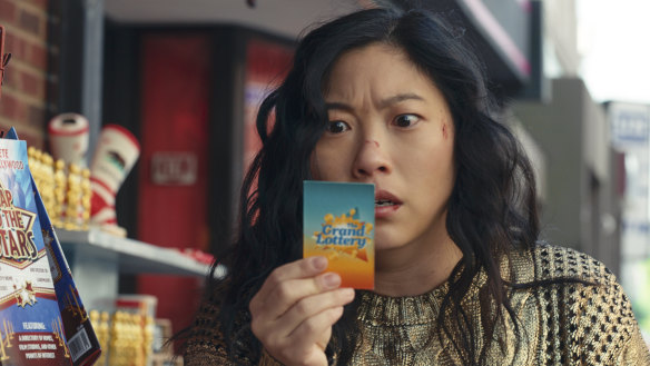 Katie Kim (Awkwafina) discovers she has won the lottery in Jackpot!