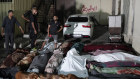 Palestinians mourn relatives killed in an Israeli bombardment of a UN school at Nusseirat refugee camp.