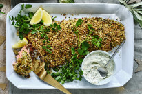 Baked salmon with a pine nut, herb and chilli crust, served with dill and caper sauce.