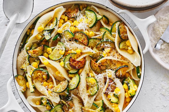 Pasta shells with zucchini and corn.