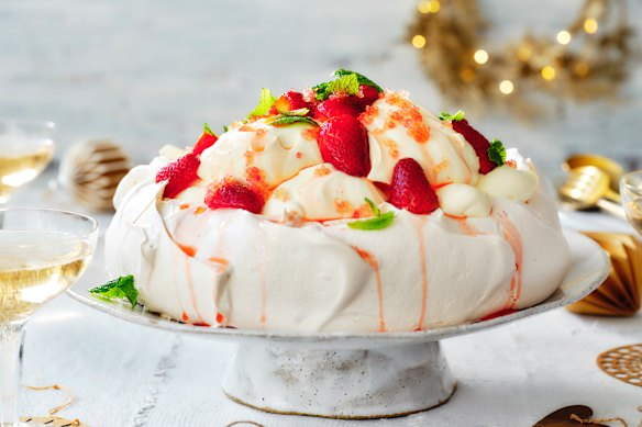 This pavlova is creamy, merry and bright, thanks to pops of finger lime.