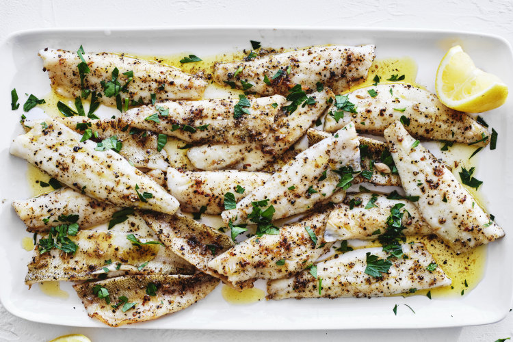 Pan-fried whiting with lemon.