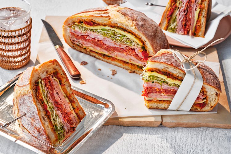 The beauty of this sandwich is that it actually wants to be made ahead of time to feed a crowd.