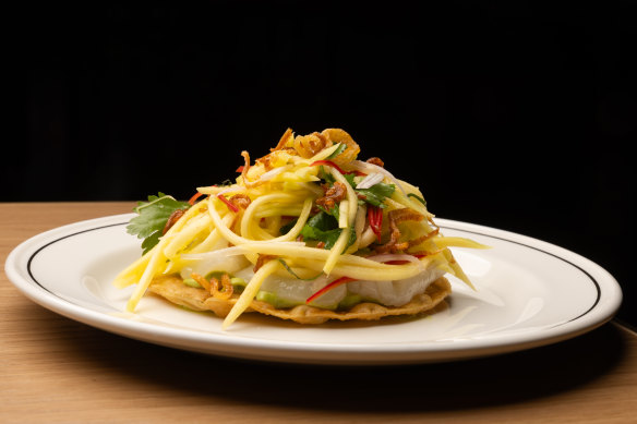 The raw scallop tostada with green mango.