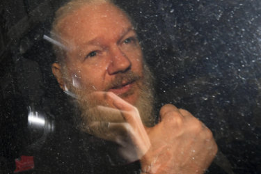 Julian Assange arrives at Westminster Magistrates' Court in London.