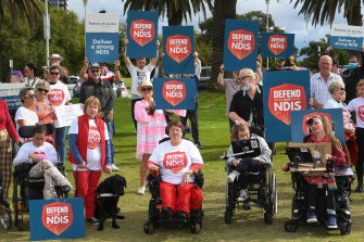 Penny Manning (right) joins a protest in support of the NDIS in Geelong in March.
