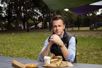 Labor look: Opposition Leader Chris Minns lunches in a Carlton park on sandwiches from Love of Beans.