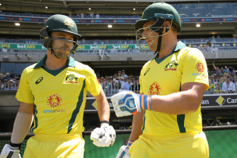 Travis Head (left) is back in Australia’s T20 team. He is seen here with captain Aaron Finch in November 2018.